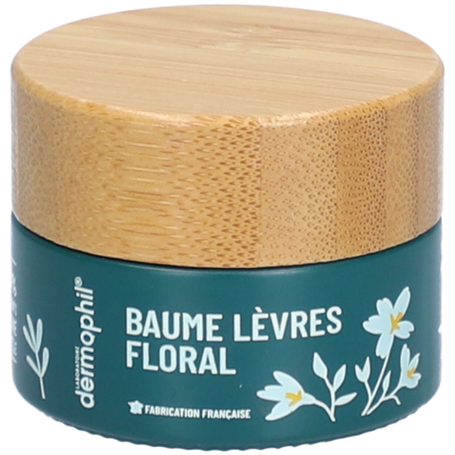 Dunkelgrüner Tiegel mit Holzdeckel. Aufschrift: BAUME LÈVRES FLORAL. Weiße Blumenmuster. Marke: dermophil.