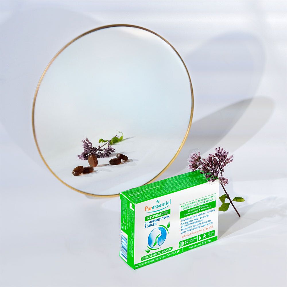 Boîte de comprimés pour la toux, miroir et fleurs. Texte: Puressentiel Respiratoire, Toux sèche ou grasse. 24 comprimés.