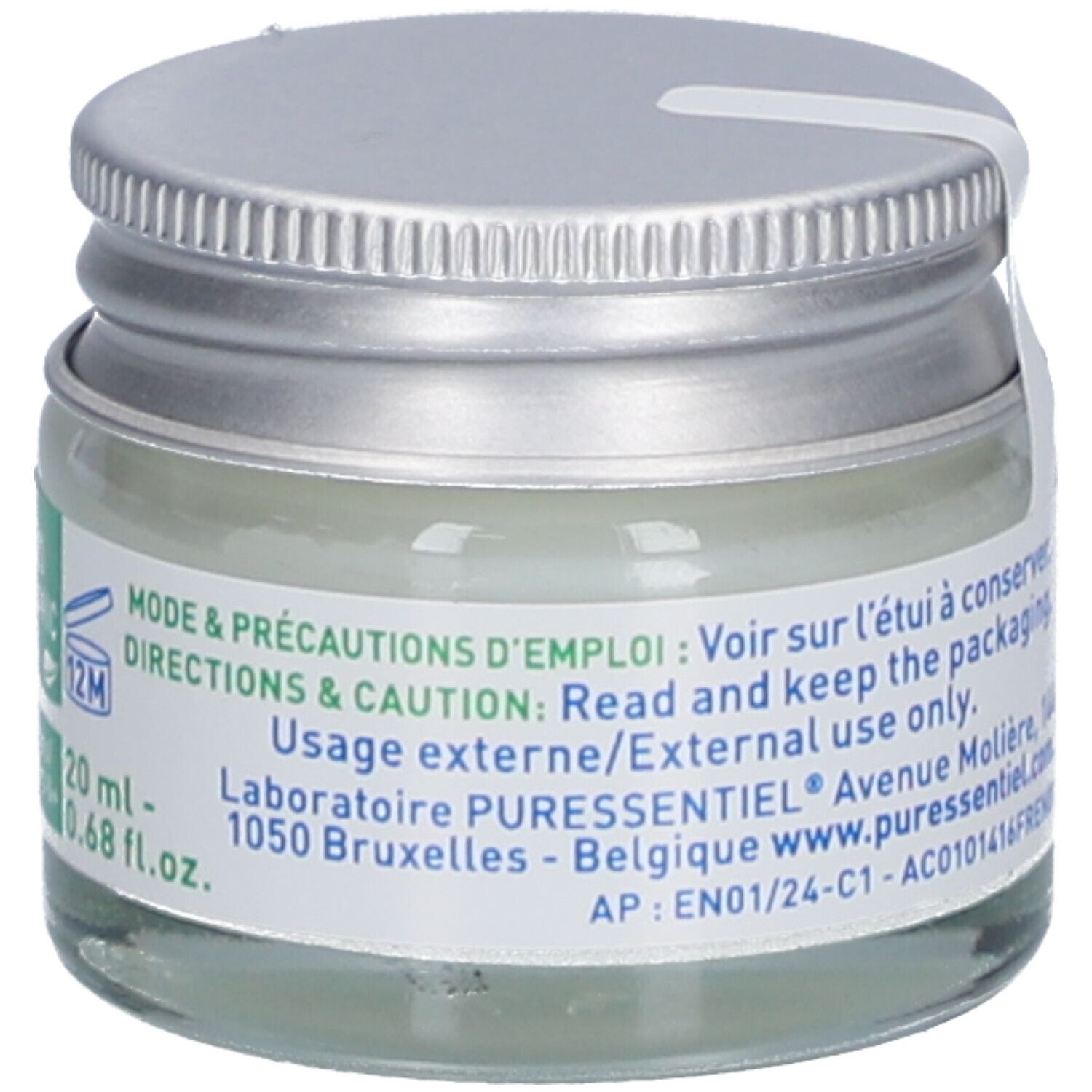 Pot en verre avec couvercle argenté. Inscription: 20 ml, 0.68 fl.oz. Texte sur l'étiquette. Sceau.