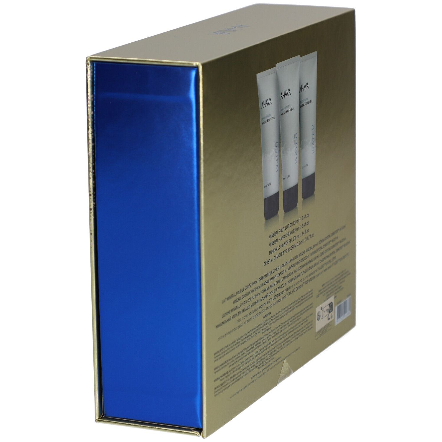 Coffret doré avec trois tubes. Inscription: AHAVA, Mineral Body Lotion, Hand Cream, Shower Gel.