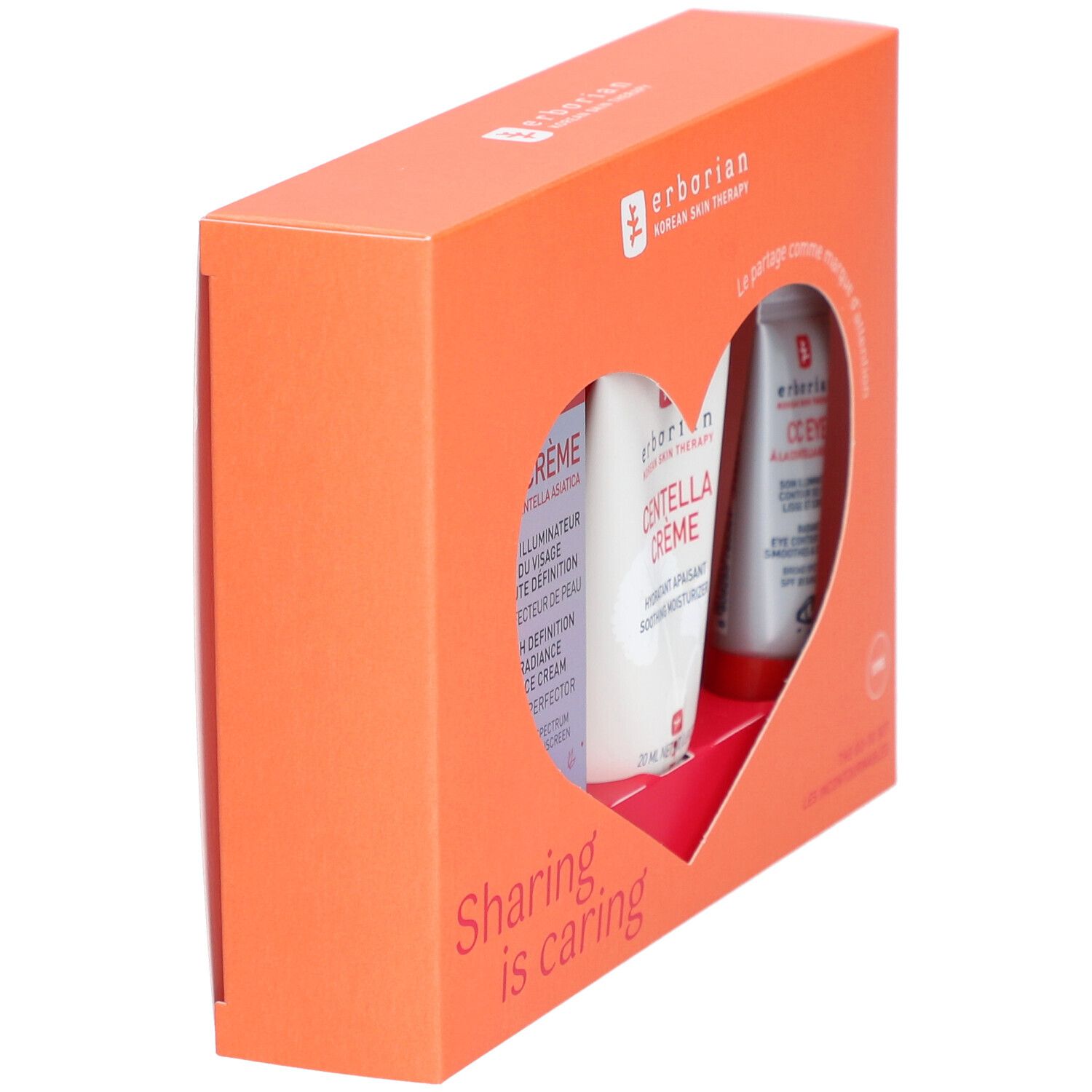 Oranje geschenkverpakking met hartvormige uitsparing. Zichtbaar: CC Crème en Centella Crème. Tekst: Erborian, Sharing is caring.