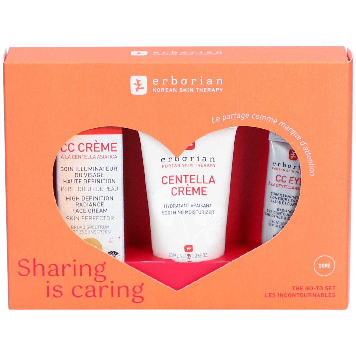 Oranje geschenkverpakking met drie producten. Zichtbaar: CC Crème, Centella Crème en CC Eye. Tekst: Erborian, Sharing is caring.