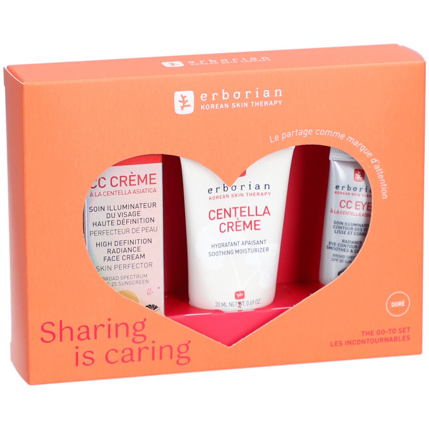 Oranje geschenkverpakking met drie producten. Zichtbaar: CC Crème, Centella Crème en CC Eye. Tekst: Erborian, Sharing is caring.