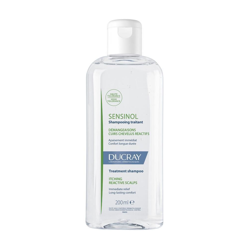 Flacon transparent avec bouchon blanc. Inscription: SENSINOL, Shampooing traitant, Ducray. Texte: Démangeaisons, cuirs chevelus réactifs.