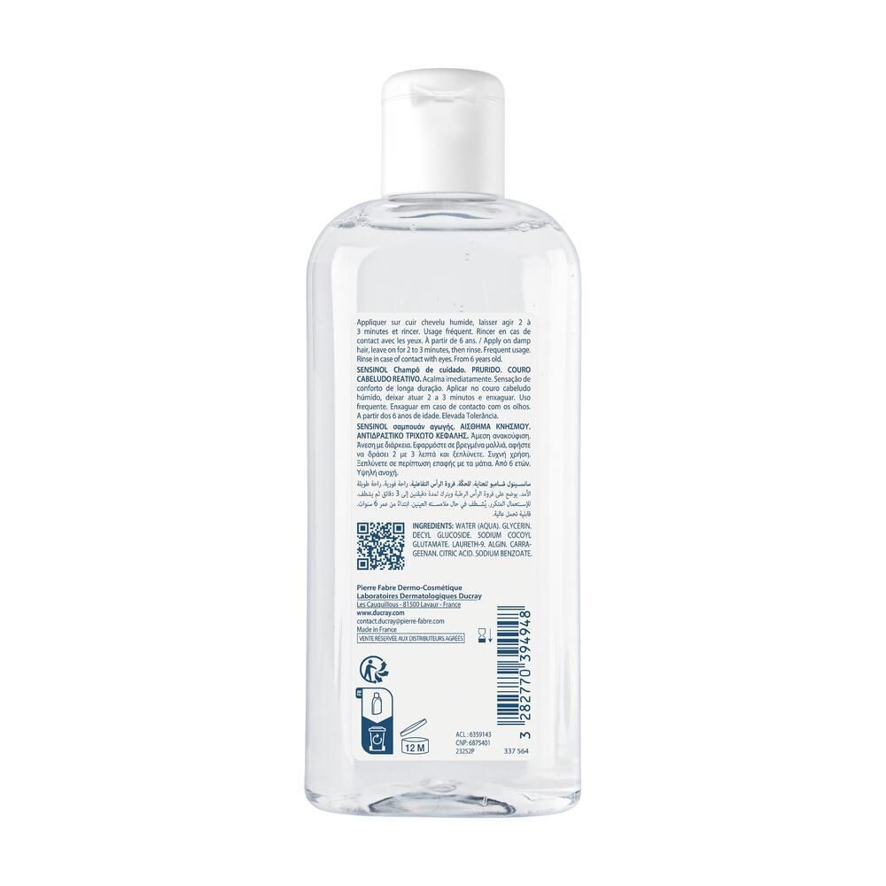 Dos d'un flacon transparent avec bouchon blanc. Texte et code QR. Ingrédients et informations du fabricant.