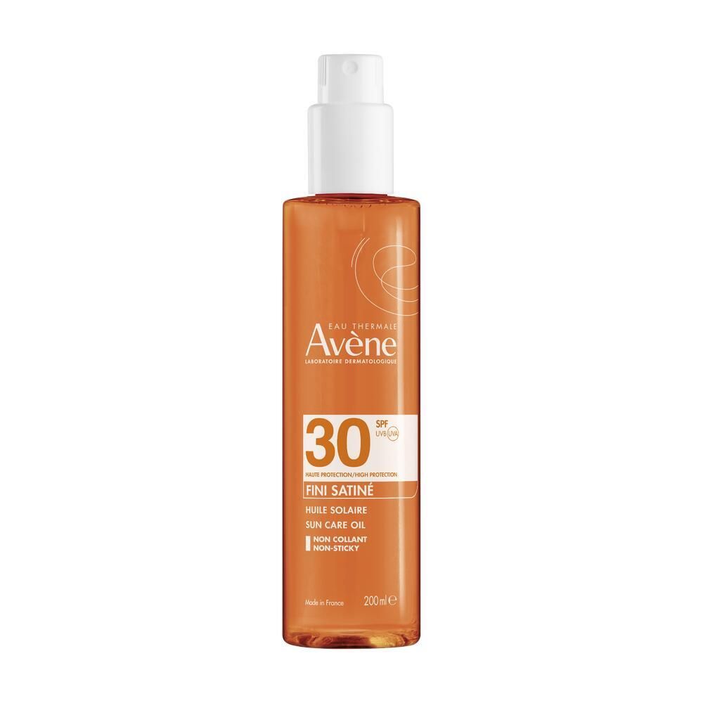 Avène Sonnenschutzöl SPF30. Transparente Flasche mit weißem Sprühkopf. Etikett mit Produktinformationen und SPF-Wert.