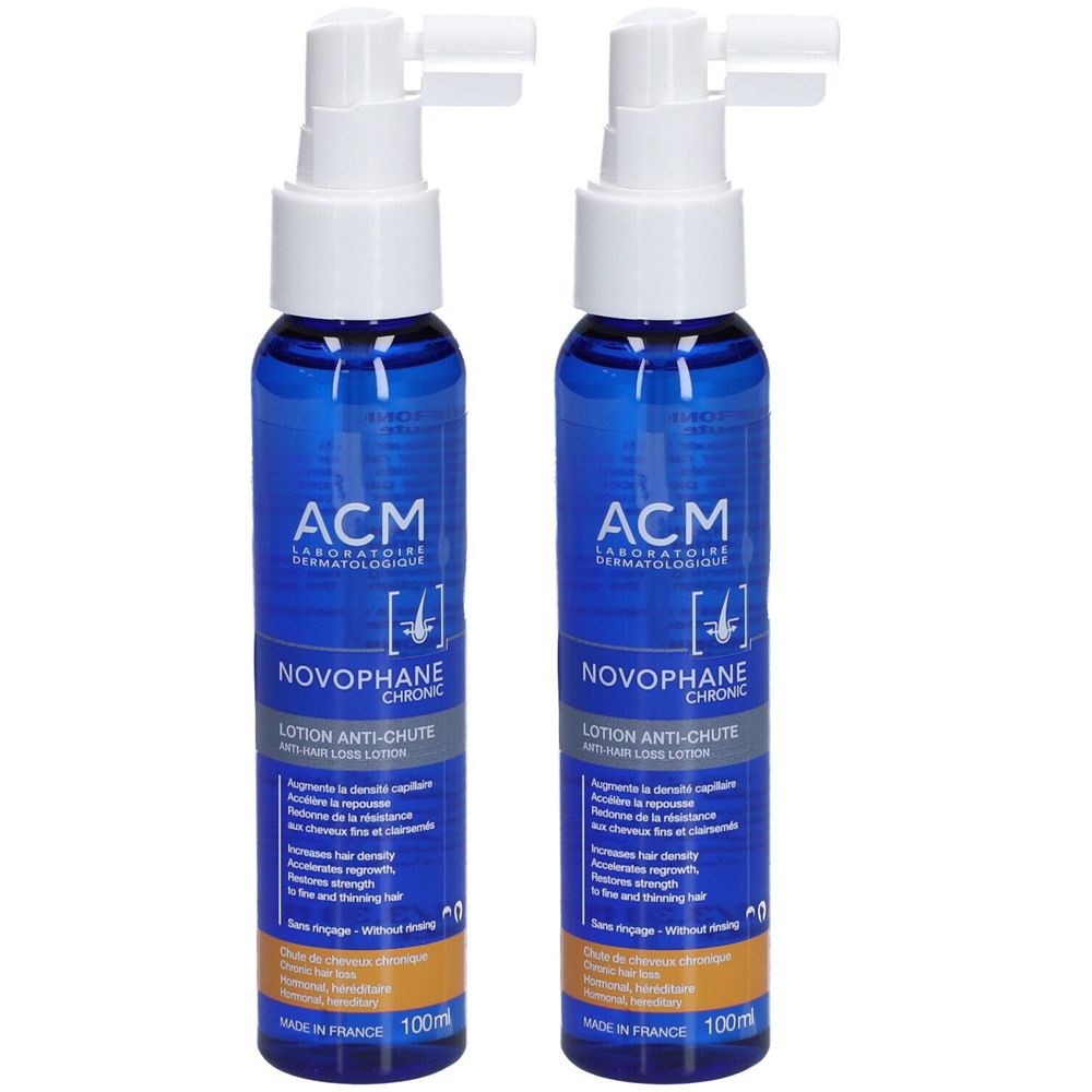 Deux flacons bleus avec vaporisateur blanc. Inscription: ACM, Novophane, Lotion Anti-Chute. Texte en français. 100ml.