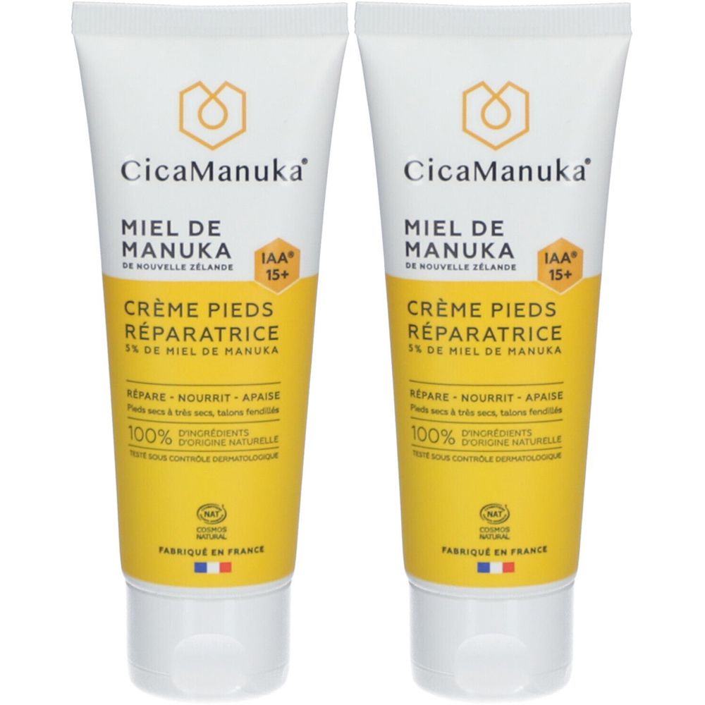 Deux tubes de Crème pieds réparatrice CicaManuka. Tubes blancs avec détails jaunes et informations produit.