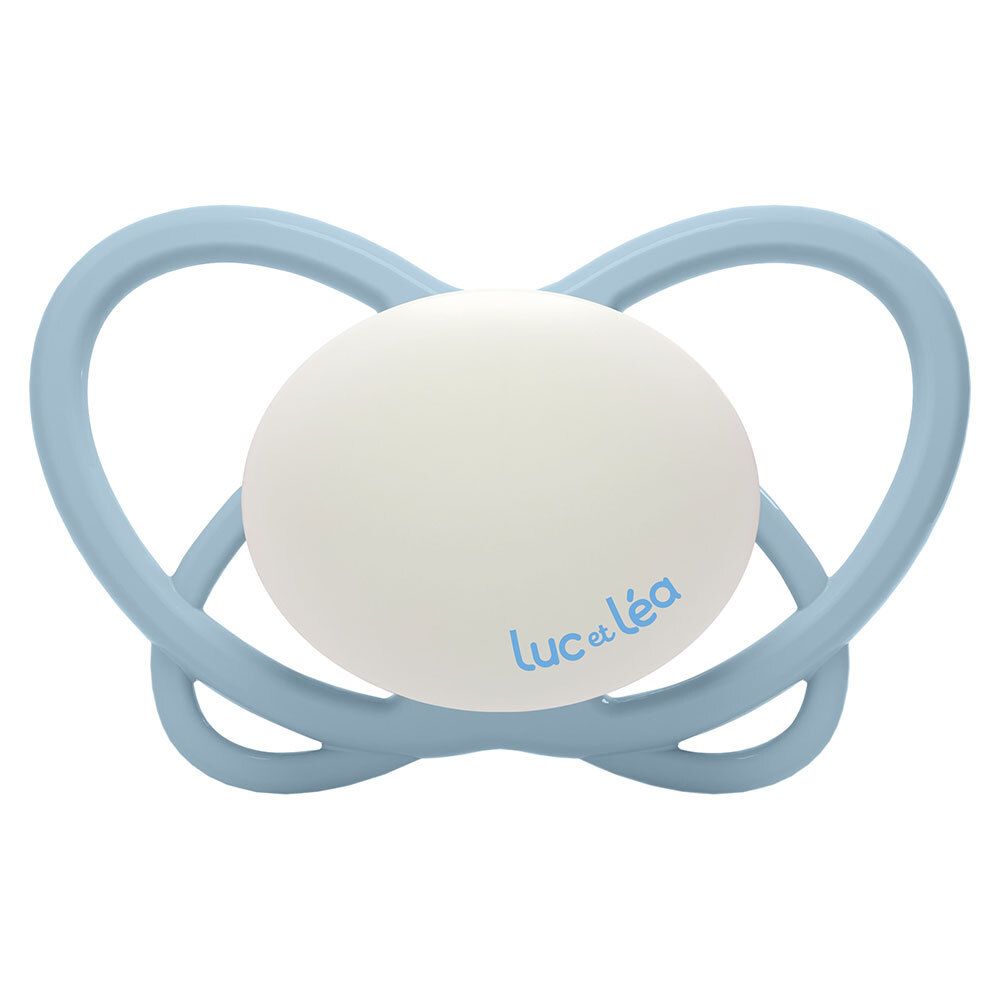 Sucette bleue avec partie ronde blanche. Marque Luc et Léa. Forme physiologique.