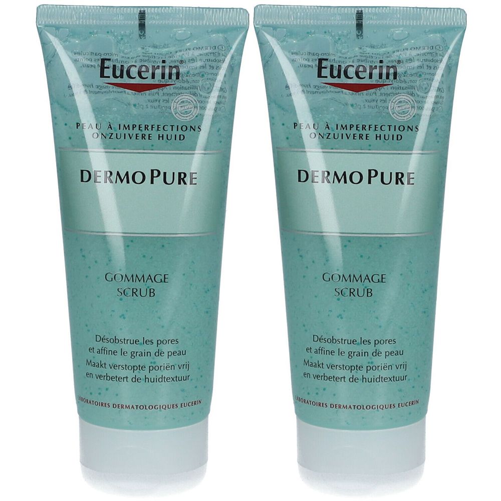 Deux tubes de gommage Eucerin DermoPure. Tubes turquoise avec bouchon blanc. Inscriptions multilingues.
