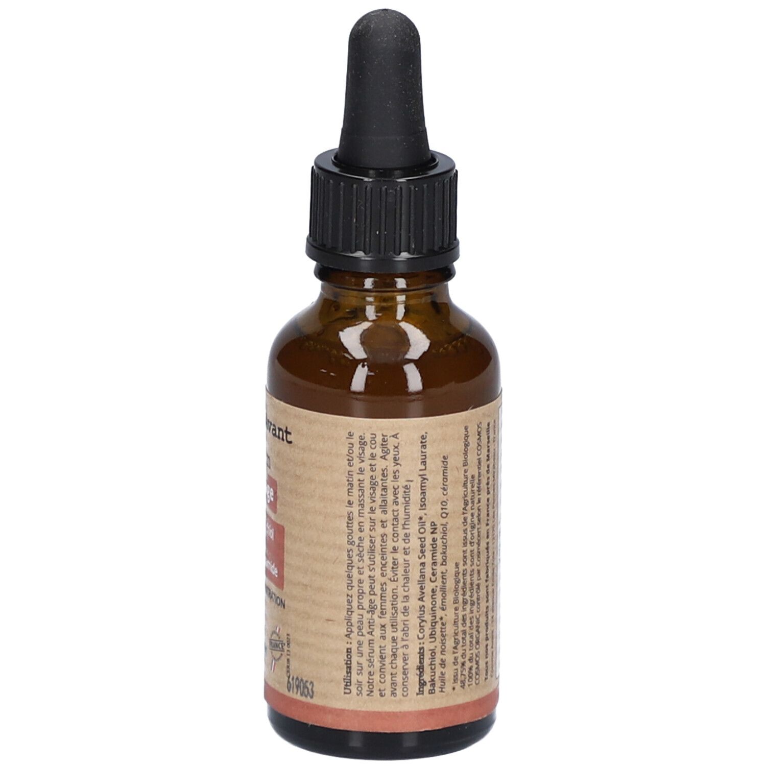 Dos d'un flacon en verre brun avec compte-gouttes noir. Étiquette avec instructions et ingrédients. Label Vegan.