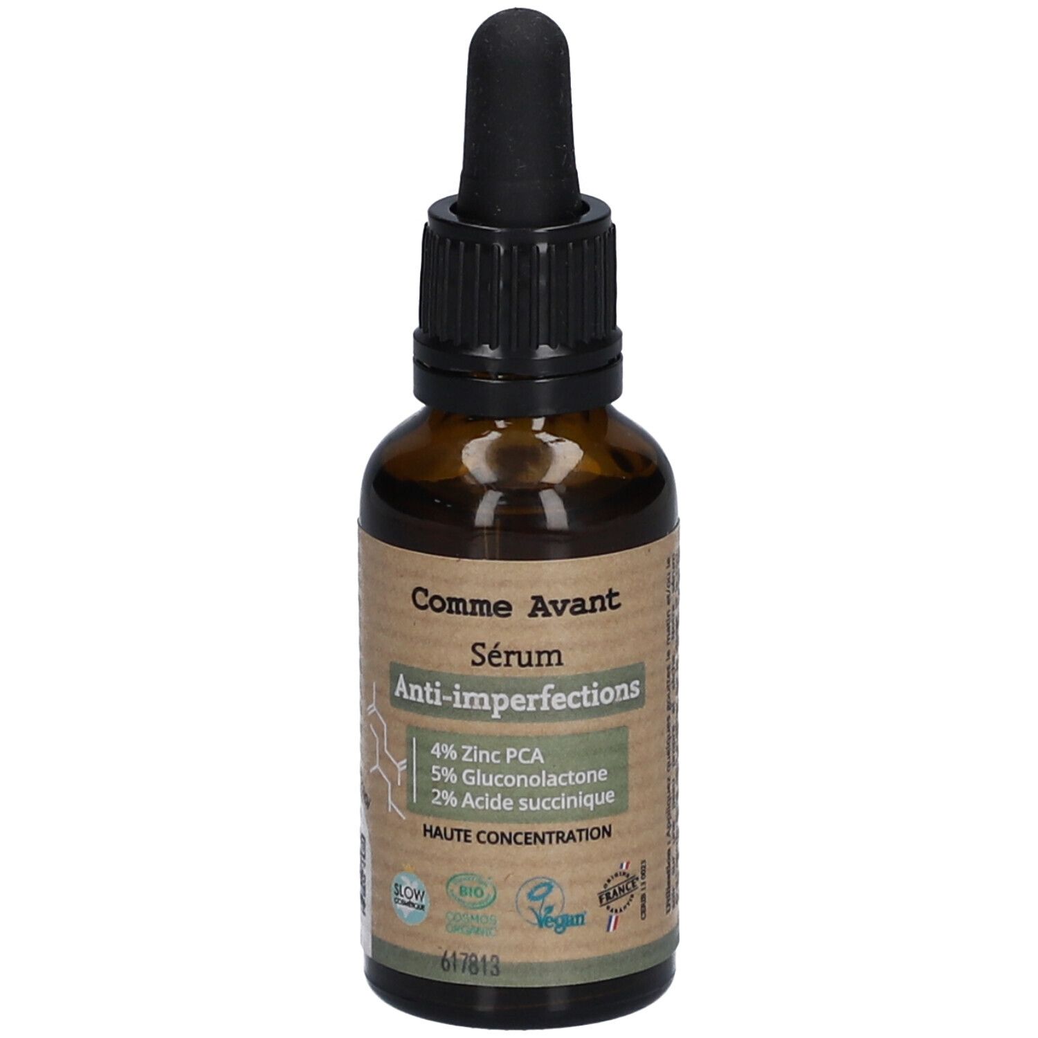 Bruine glazen fles met zwarte druppelaar. Etiket met productnaam en ingrediënten: 4% Zink PCA, 5% Gluconolacton, 2% Acide succinique.