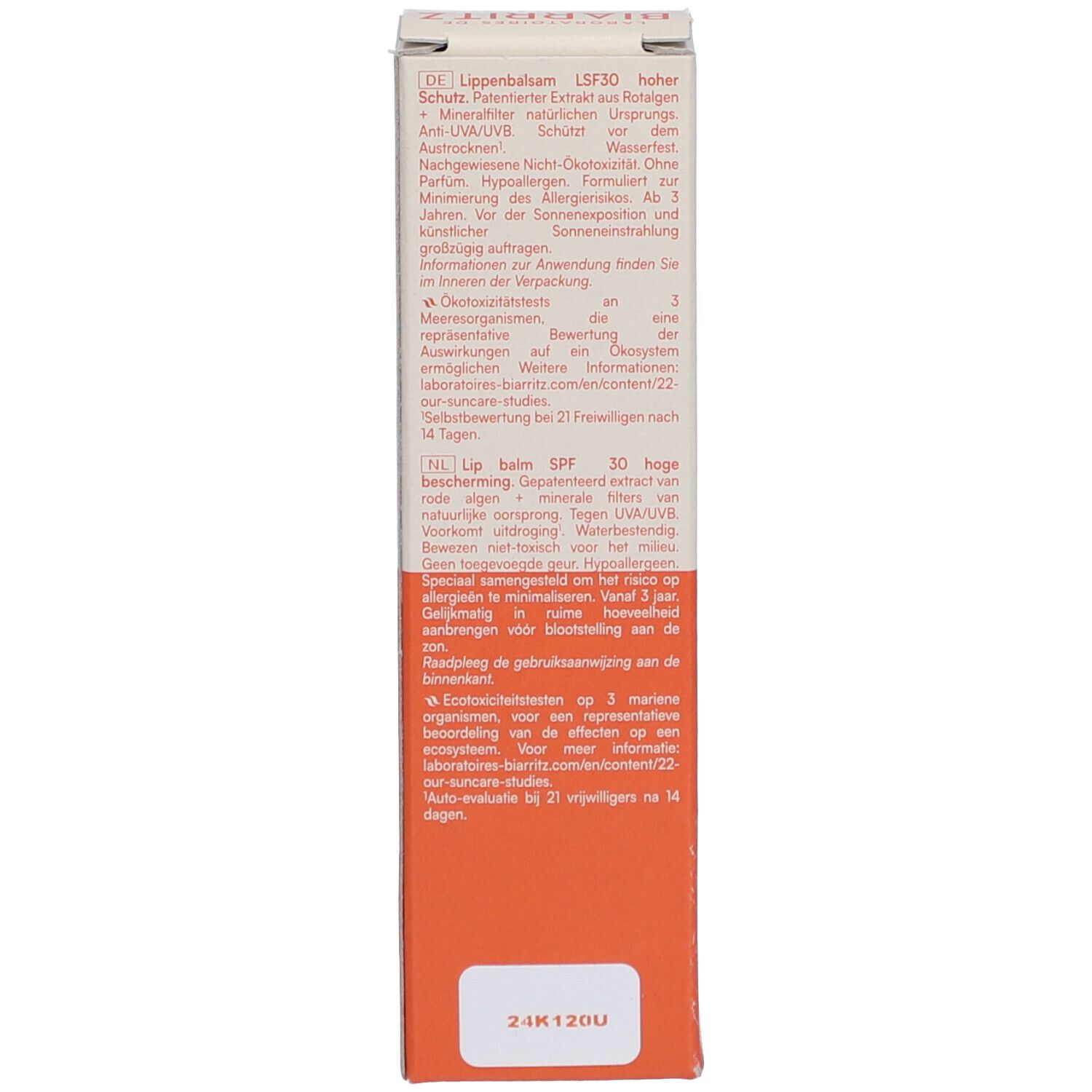 Côté de l'emballage du produit. Texte en allemand et néerlandais. Logos et informations. Fond orange.