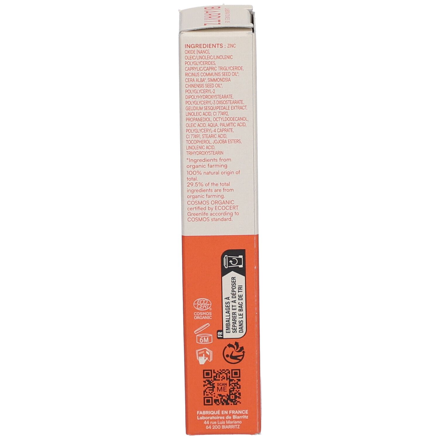Côté de l'emballage du produit. Liste des ingrédients, logos et informations. Fond orange. Code QR.