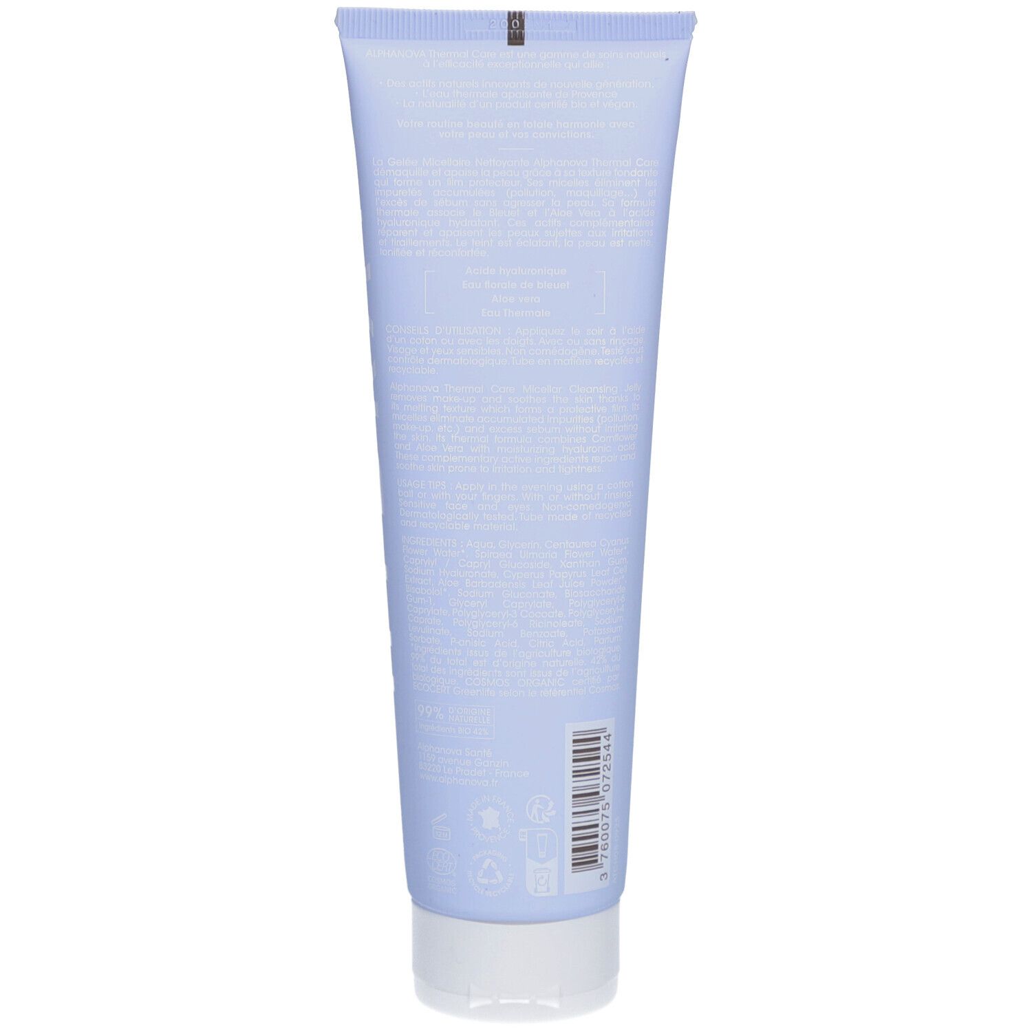 Dos d'un tube bleu clair. Texte en petits caractères. Bouchon blanc. Code-barres et logos.