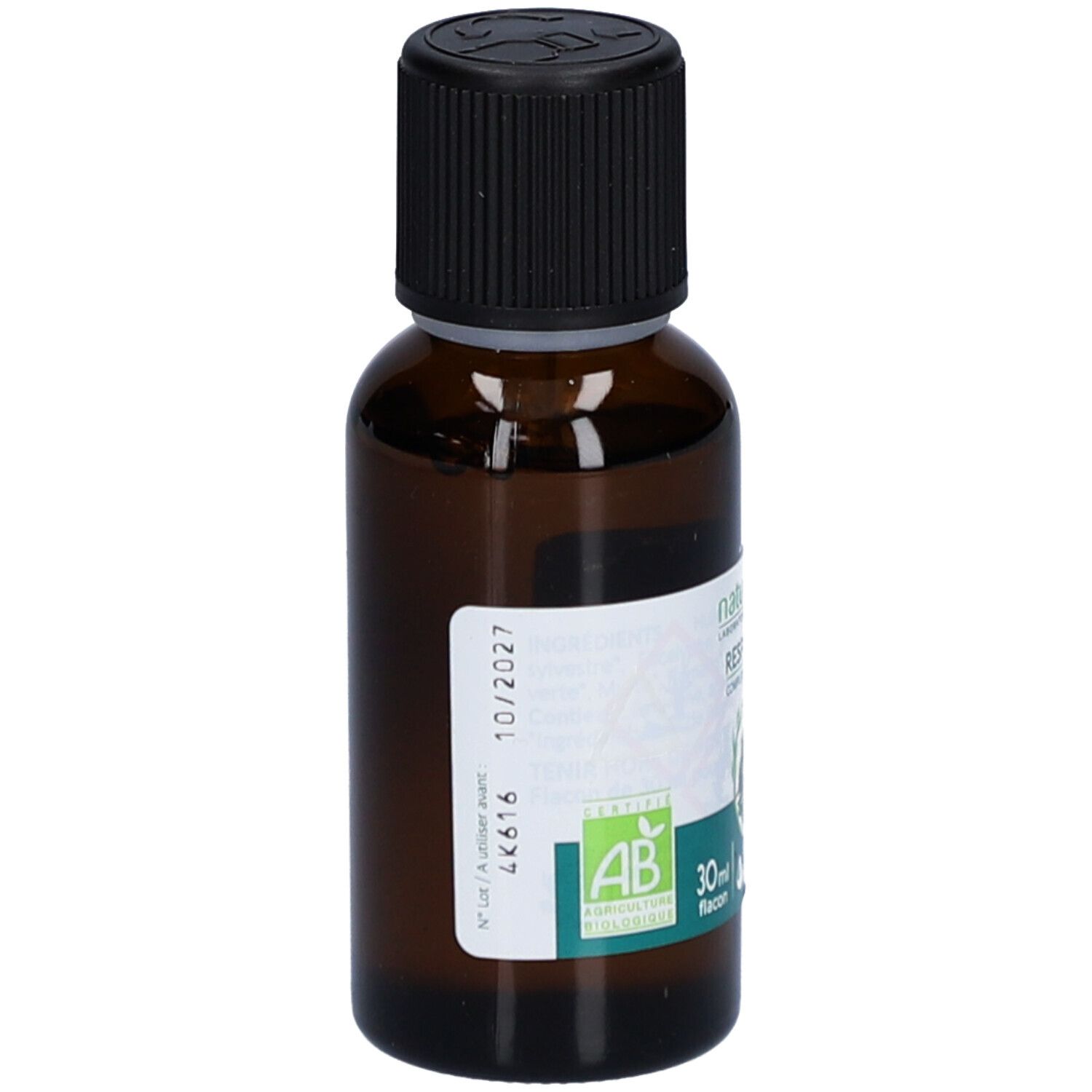 Flacon en verre brun avec bouchon noir. Étiquette avec texte et logo. Certification bio. 30 ml. Expiration 10/2027.