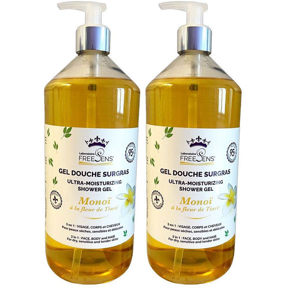 Deux flacons de gel douche avec pompe. Inscription : Freesens Gel Douche Surgras, Monoi à la fleur de Tiaré. Liquide jaune.