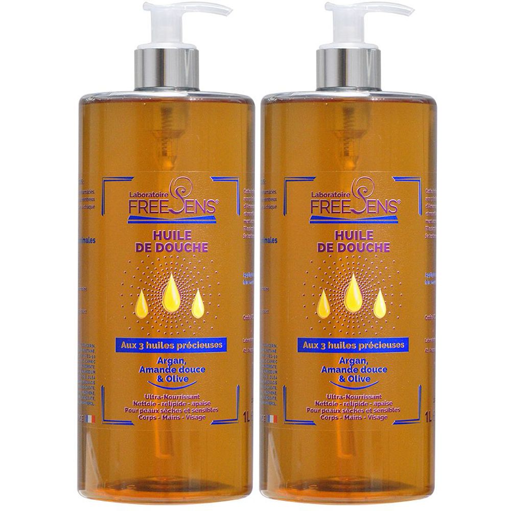 Deux flacons d'huile de douche avec pompe doseuse. Inscription: FREE SENS, Huile de Douche, avec Argan, Amande et Olive.
