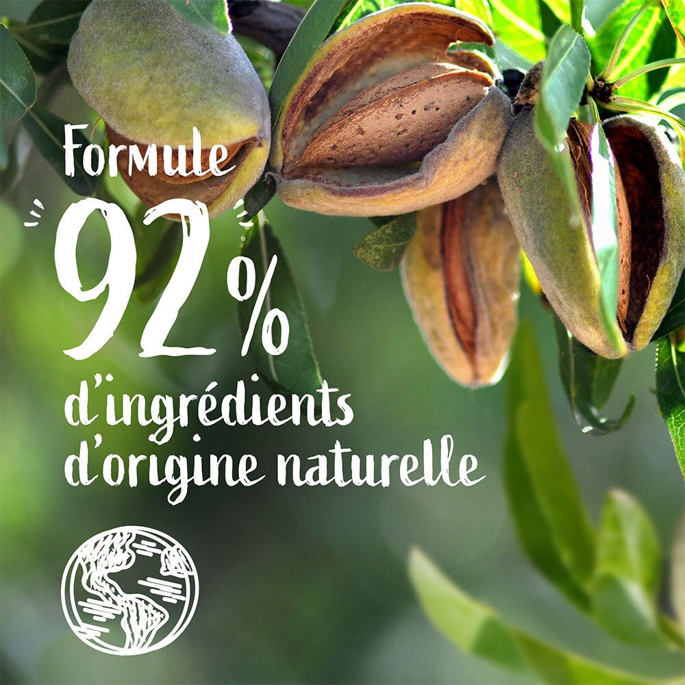 Amandelen aan een boom. Tekst: '92% ingrediënten van natuurlijke oorsprong'.