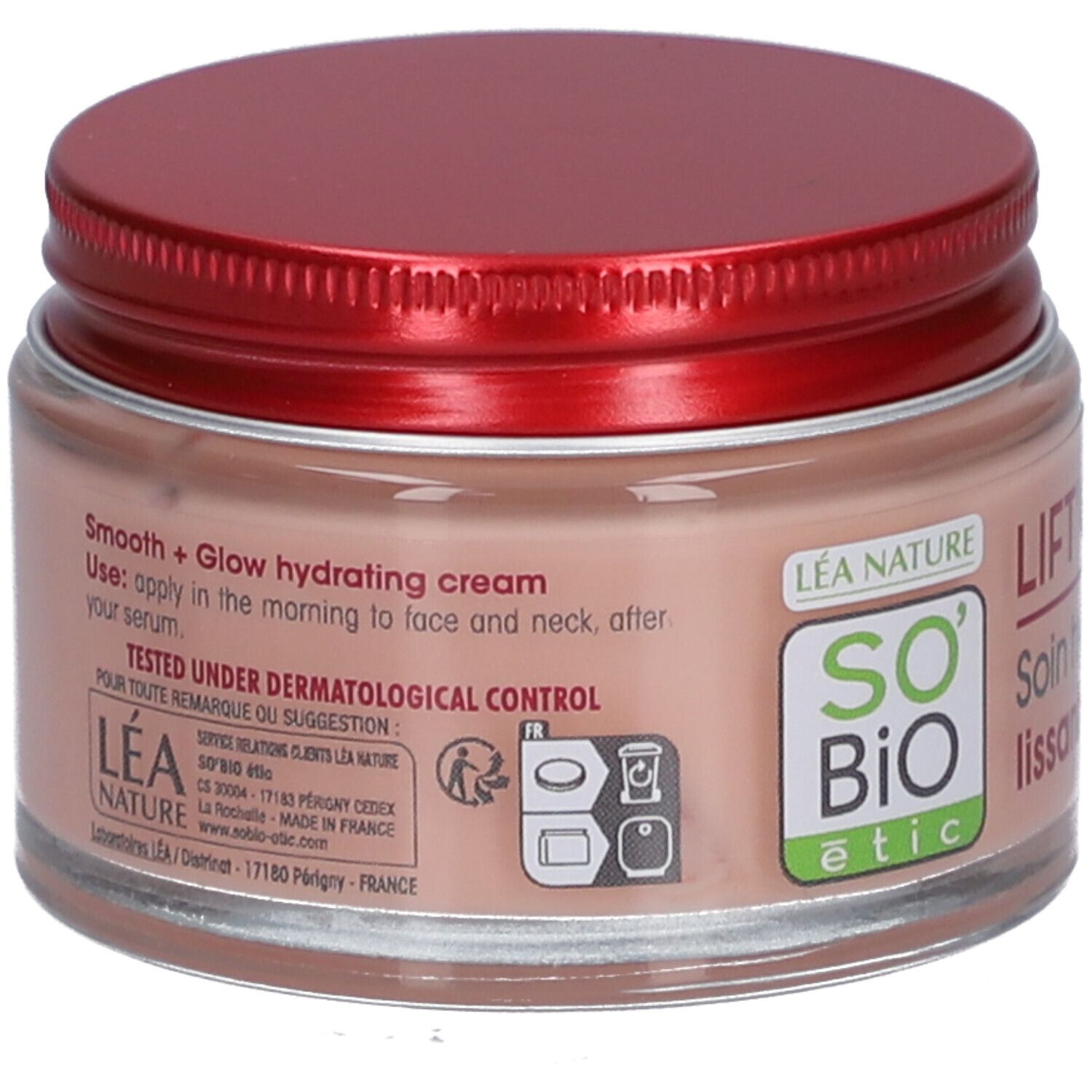 Crème en pot avec couvercle rouge. Inscription: Smooth + Glow hydrating cream. Testé sous contrôle dermatologique.