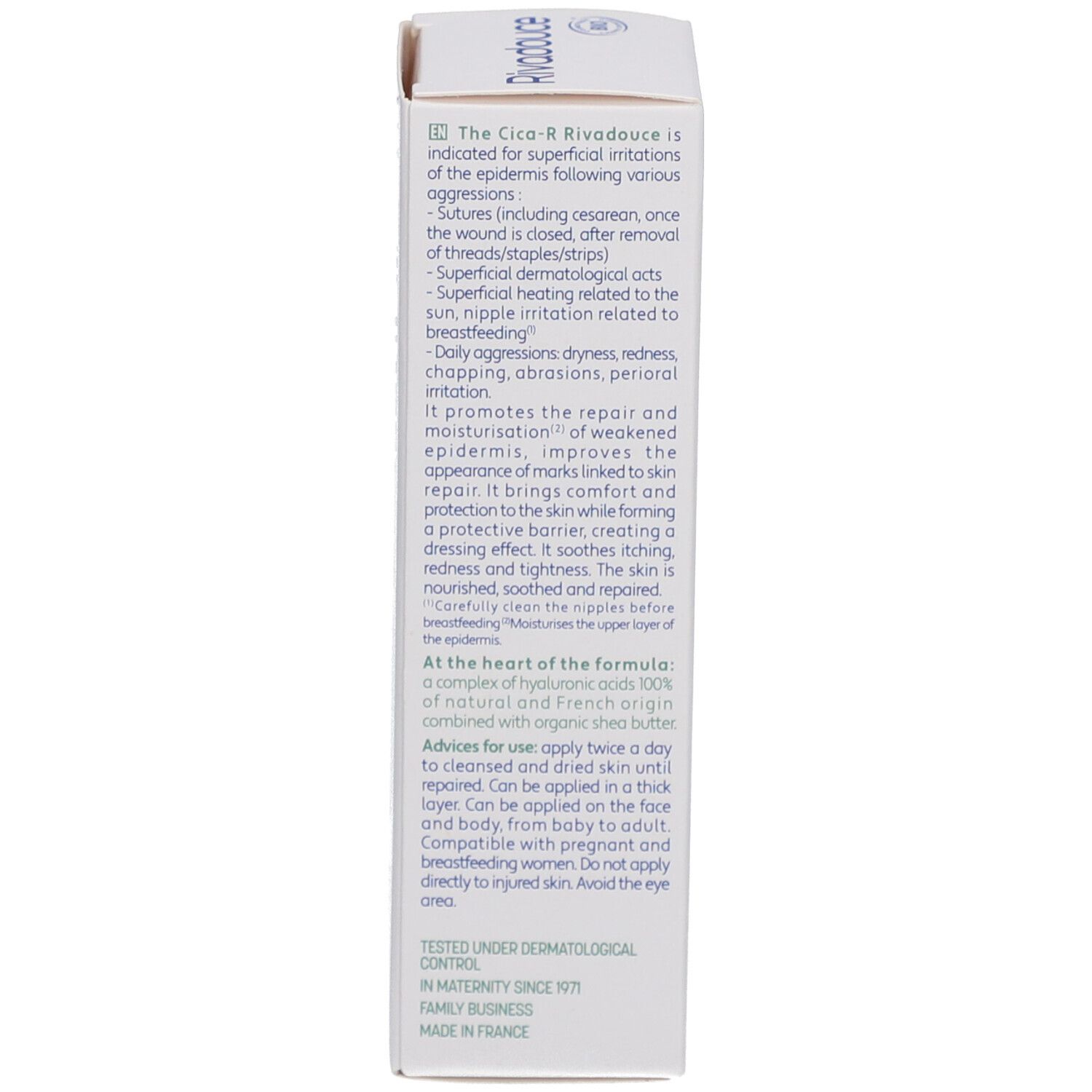 Côté de la boîte. Texte en anglais. Informations sur l'utilisation et les indications. Testé dermatologiquement. Ingrédients.