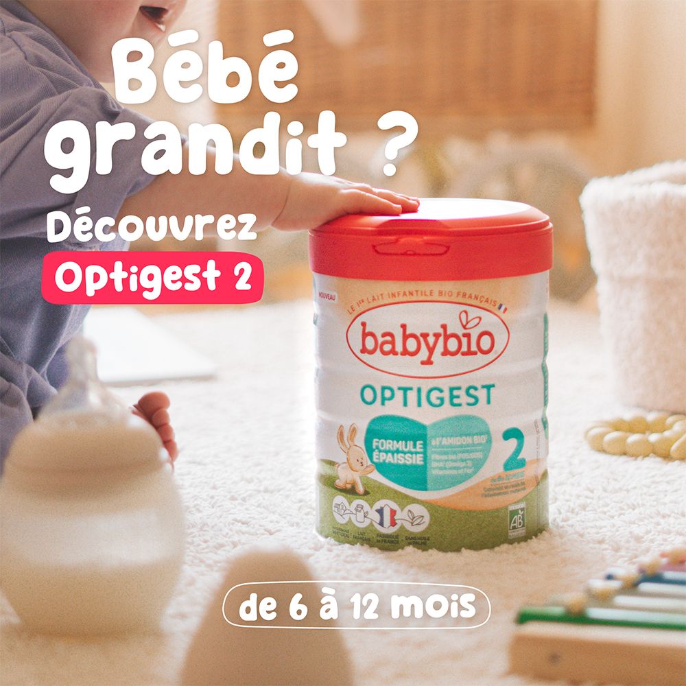 Boîte de lait infantile Babybio Optigest 2 avec couvercle rouge et étiquette montrant un lapin et le chiffre 2.