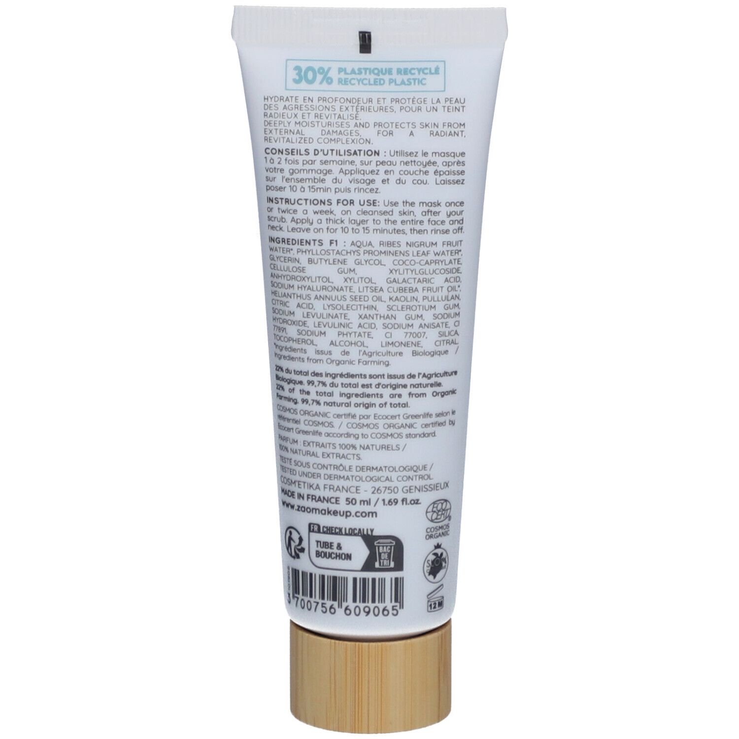 Achterkant witte tube. Ingrediënten, gebruiksaanwijzing, 30% gerecycled plastic. Houten dop. Bio-certificering.