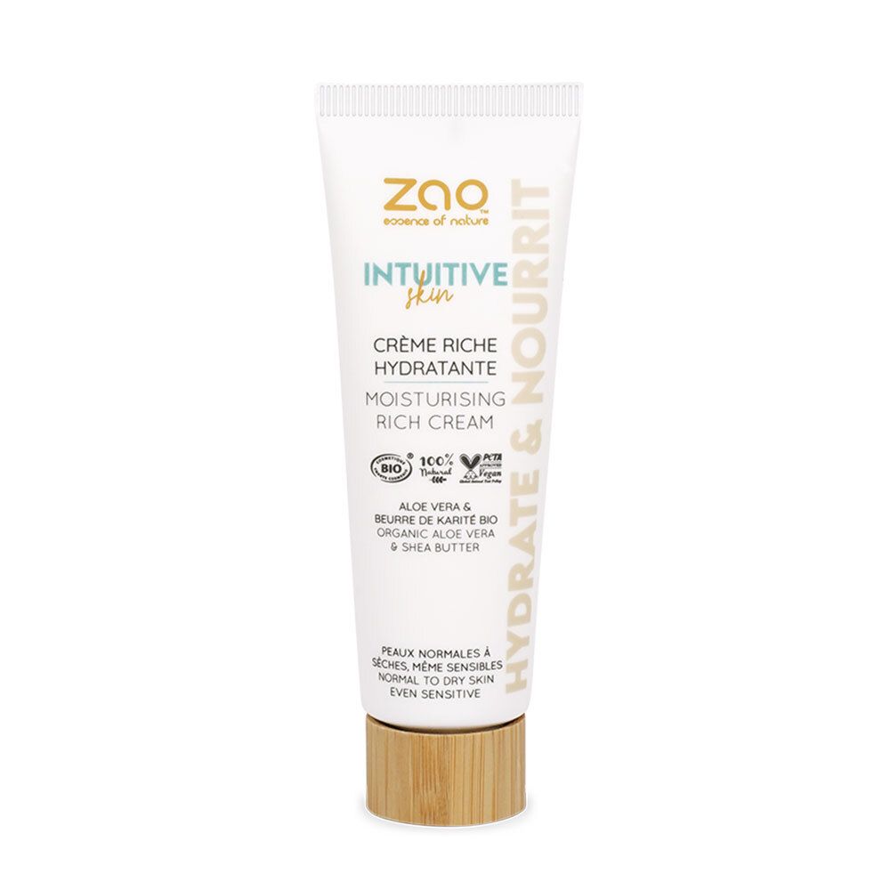 Crèmetube met productnaam en logo. Tekst: Crème Riche Hydratante, Moisturising Rich Cream. Bio-certificering.