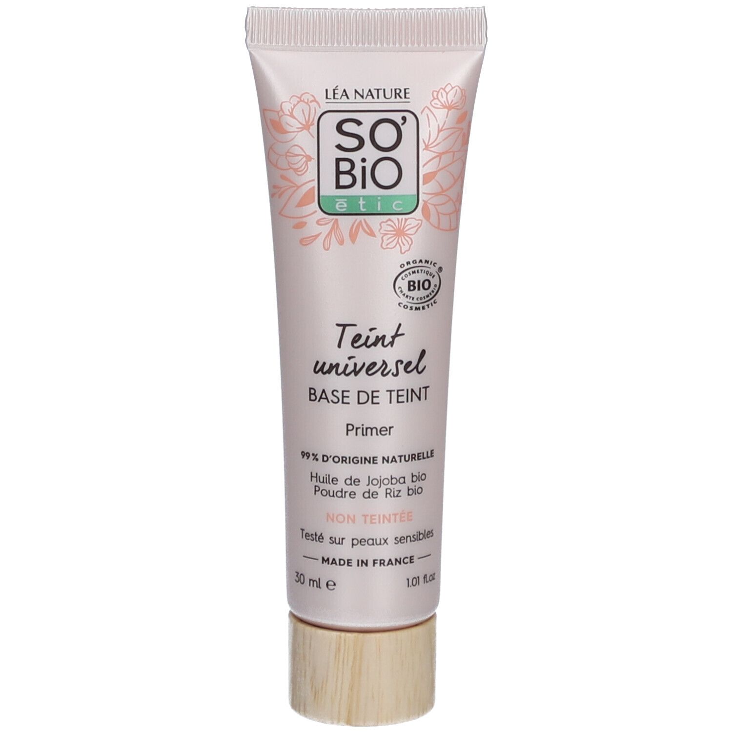 Tube de base de teint SO BIO ETIC. Inscriptions, motif floral et informations produit.