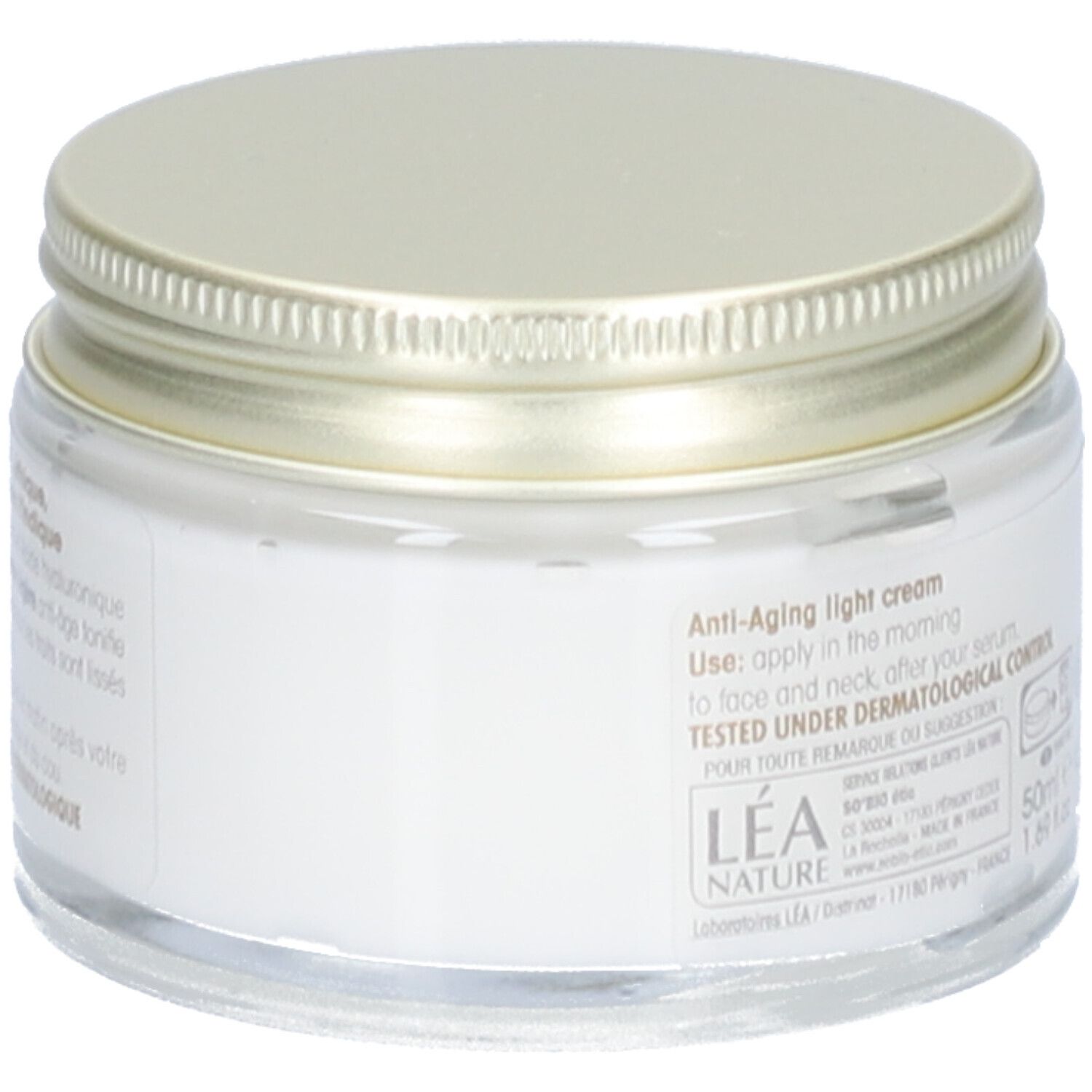 Pot de crème avec couvercle doré. Inscription: Anti-Aging light cream. Testé sous contrôle dermatologique.