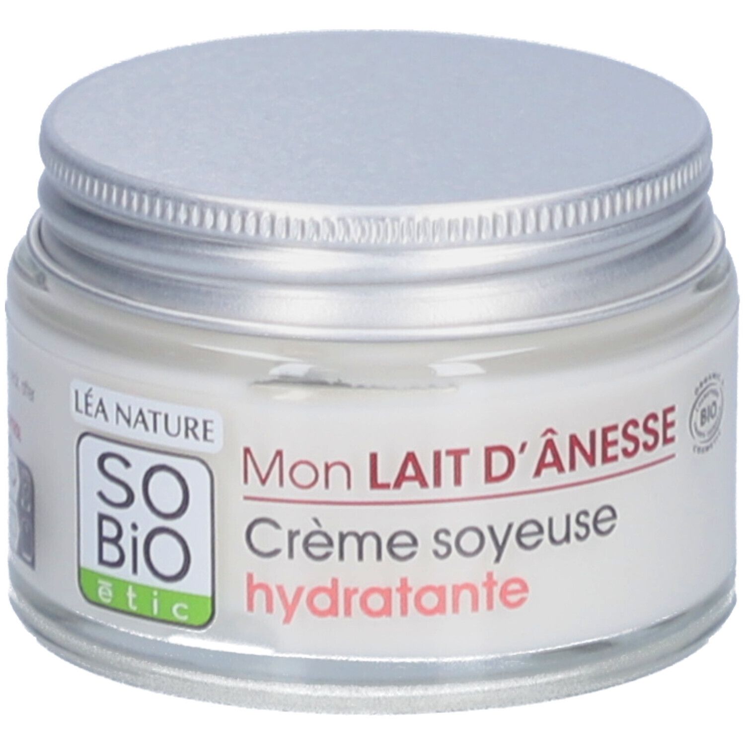 Pot de crème avec couvercle argenté. Étiquette avec texte et logo SO BIO etic. Crème soyeuse hydratante.