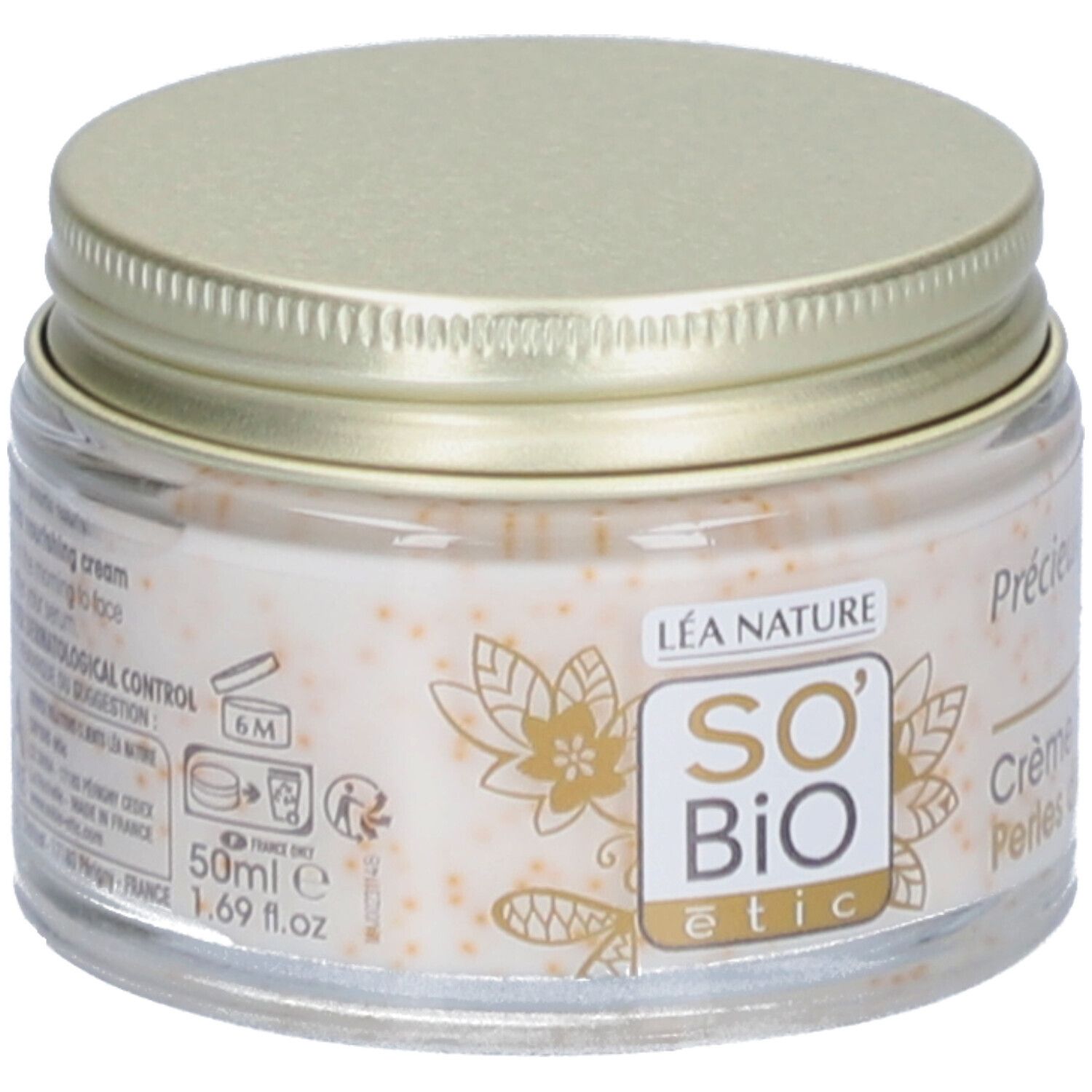Pot de crème avec couvercle doré. Logo SO BIO étic. Crème avec perles. Inscription: 50ml e 1.69 fl.oz.