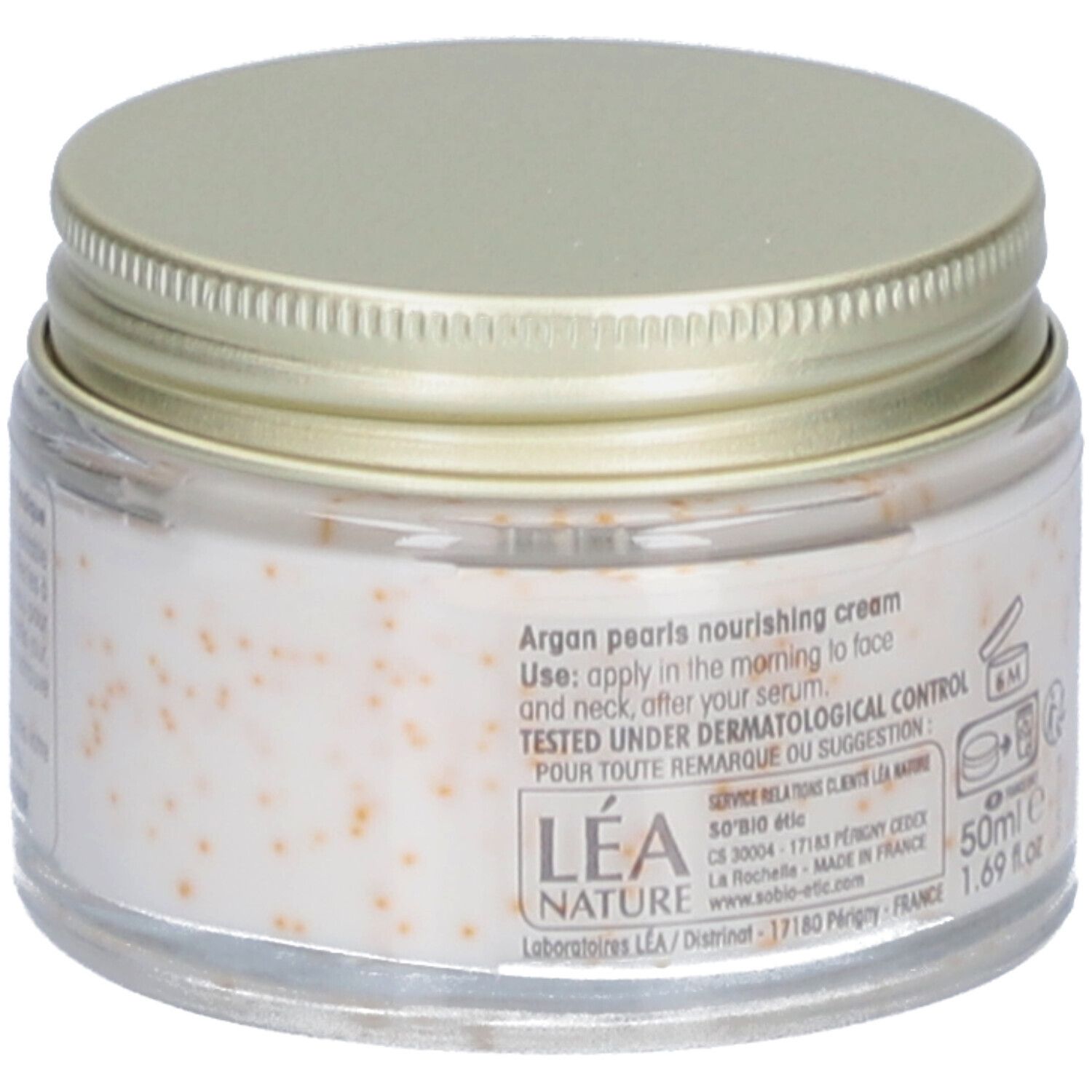 Pot de crème avec couvercle doré. Inscription: Argan pearls nourishing cream. Testé sous contrôle dermatologique. 50ml e 1.69 fl.oz.