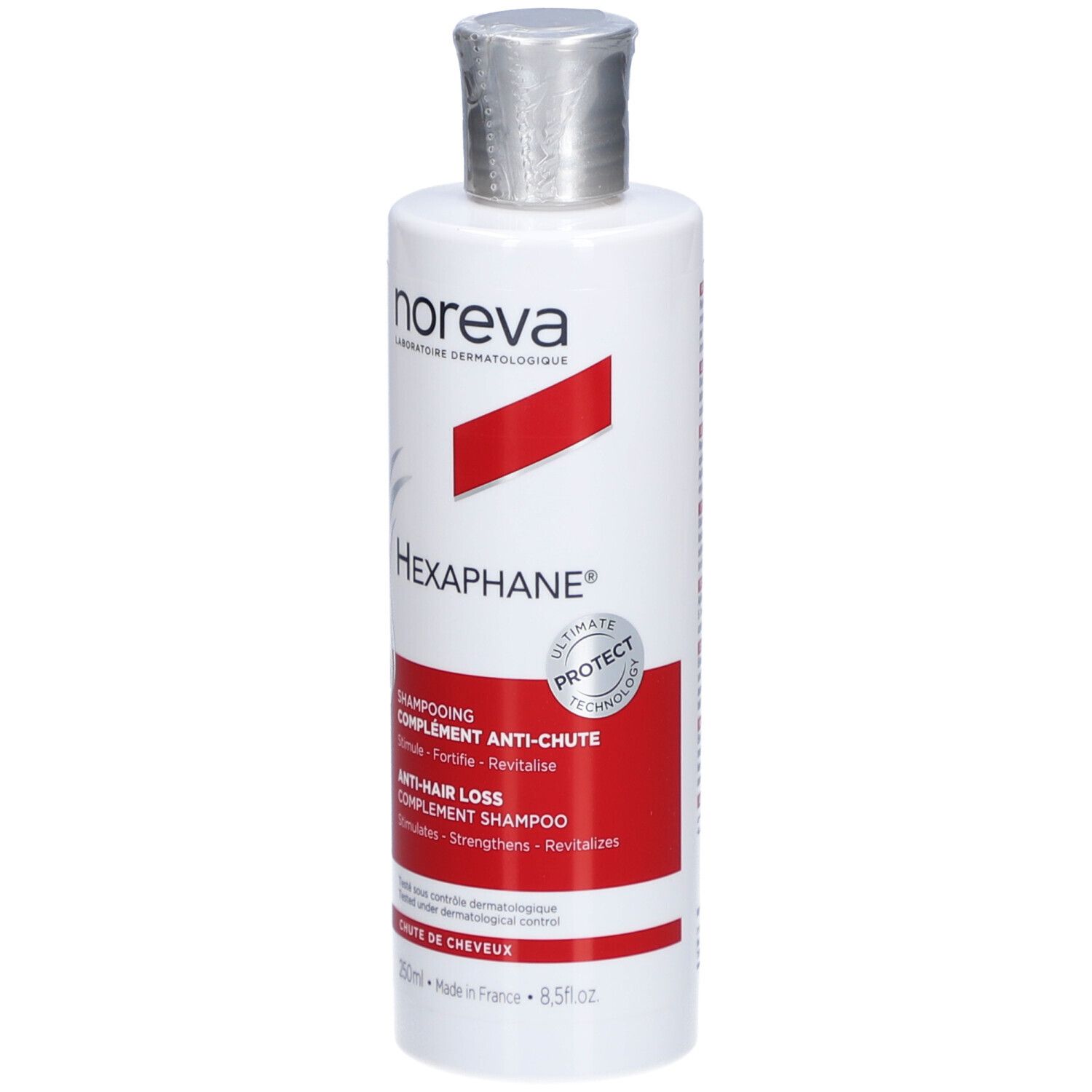 Flacon blanc, bouchon argenté. Bande rouge avec texte. Produit: Hexaphane Shampooing Anti-Chute.