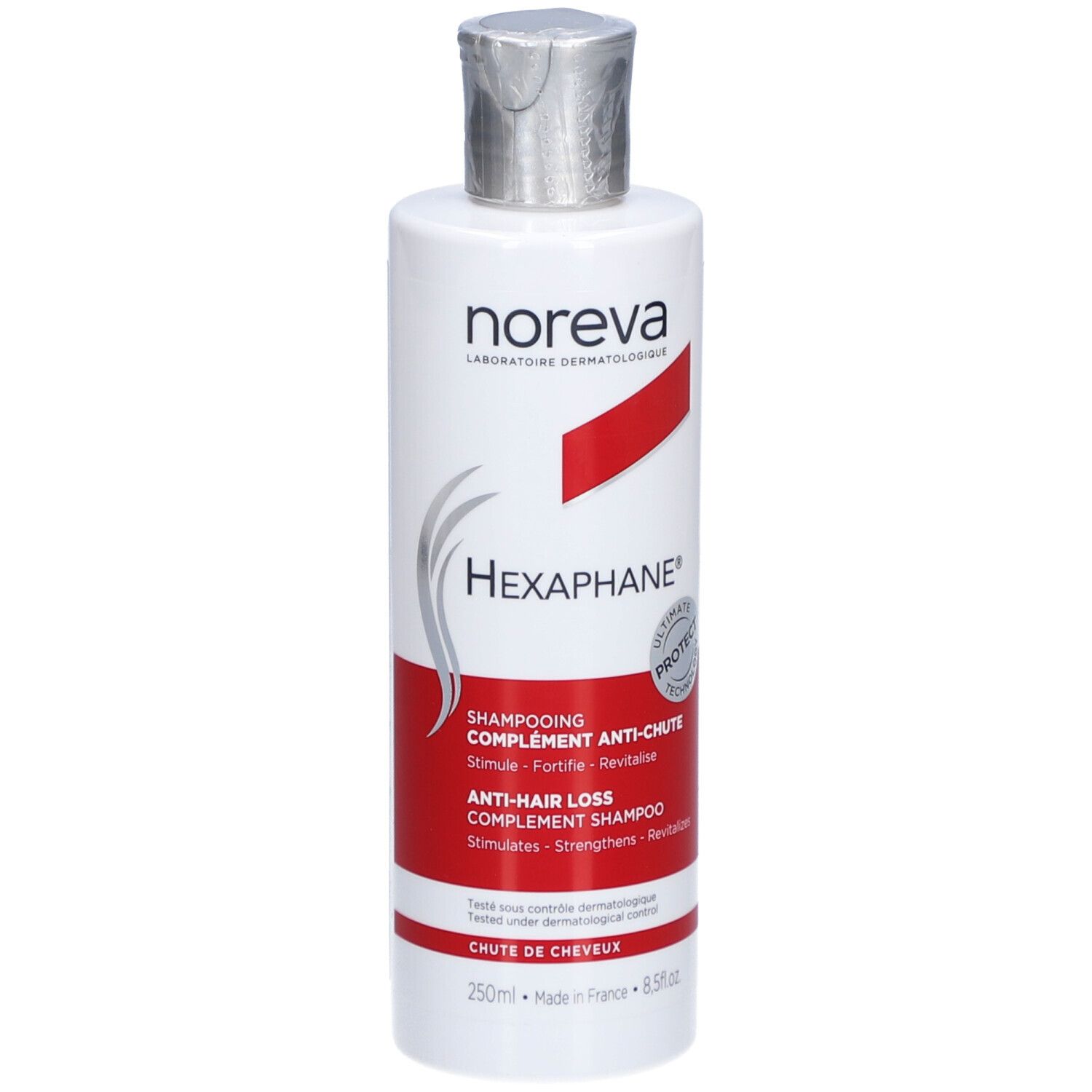 Flacon blanc, bouchon argenté. Bande rouge avec texte. Produit: Hexaphane Shampooing Anti-Chute.