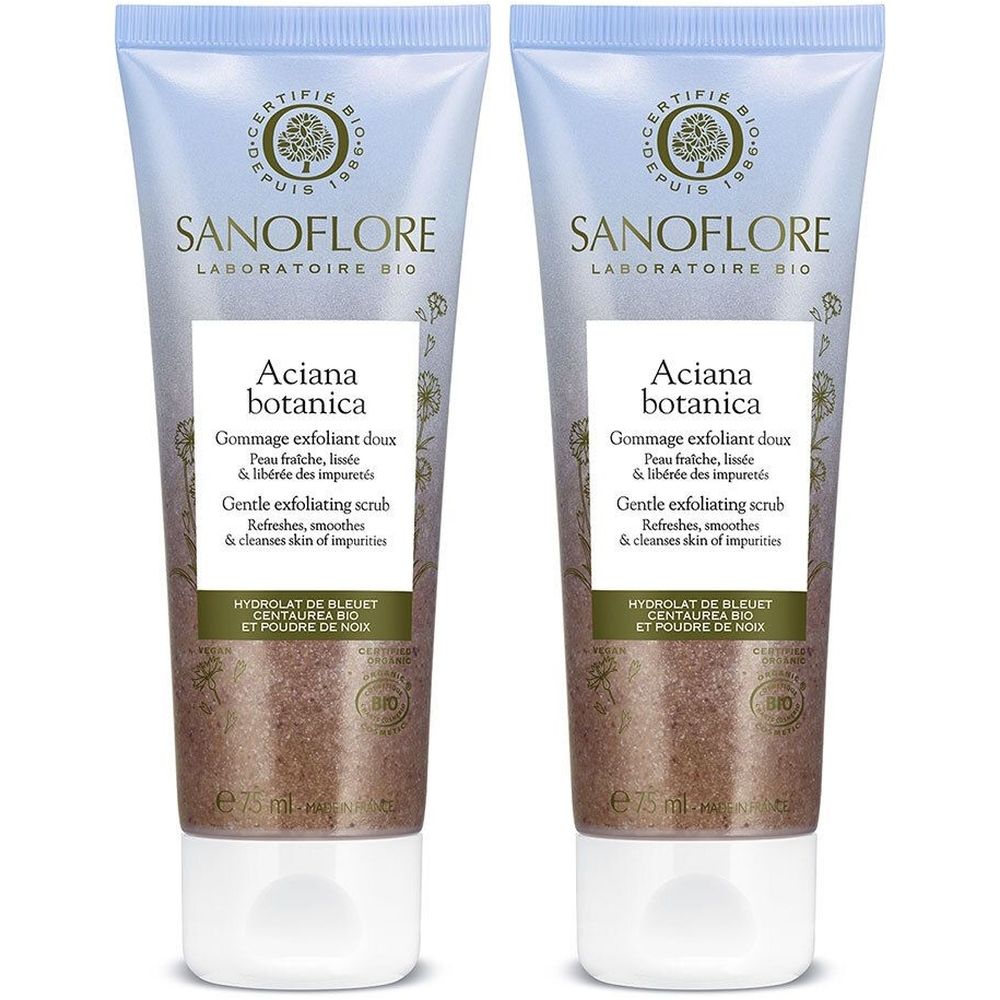 Zwei Tuben Gesichtspeeling. Hellblau-weißes Design mit Produktnamen und Bio-Zertifizierung. Enthält Text in Französisch und Englisch.