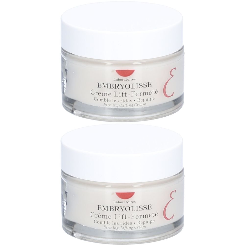 Zwei Tiegel Creme mit weißem Deckel. Aufschrift: EMBRYOLISSE Crème Lift-Fermeté. Glasbehälter.