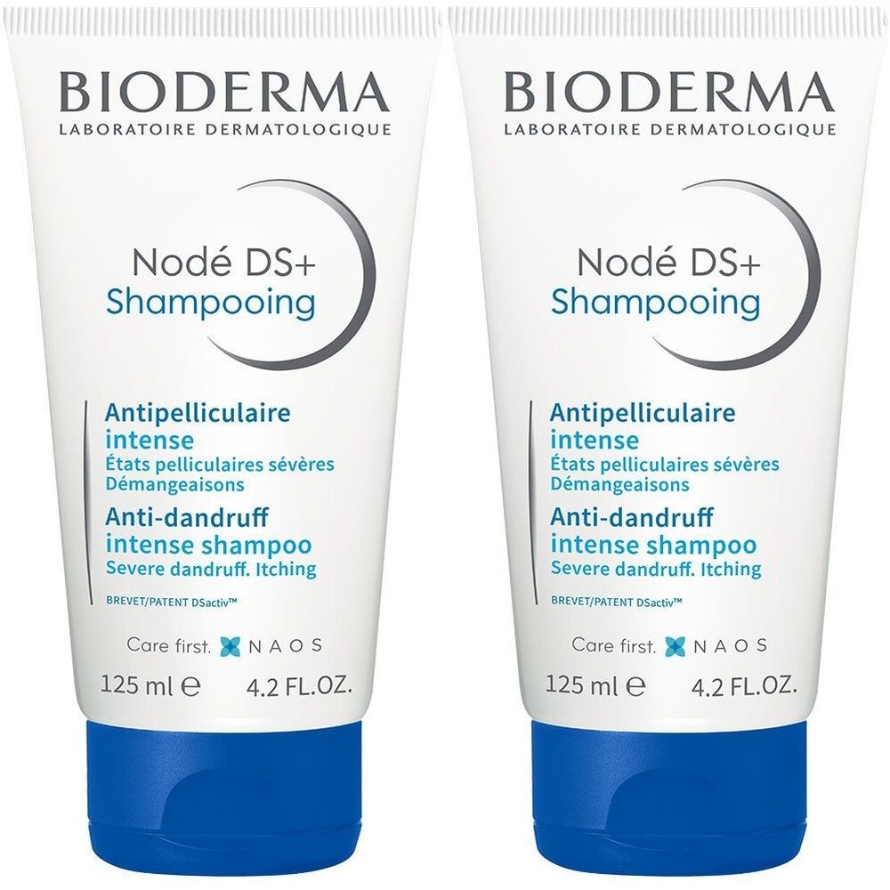 Deux tubes de shampooing blancs avec bouchon bleu. Inscription : BIODERMA, Nodé DS+ Shampooing, Anti-pelliculaire intense.