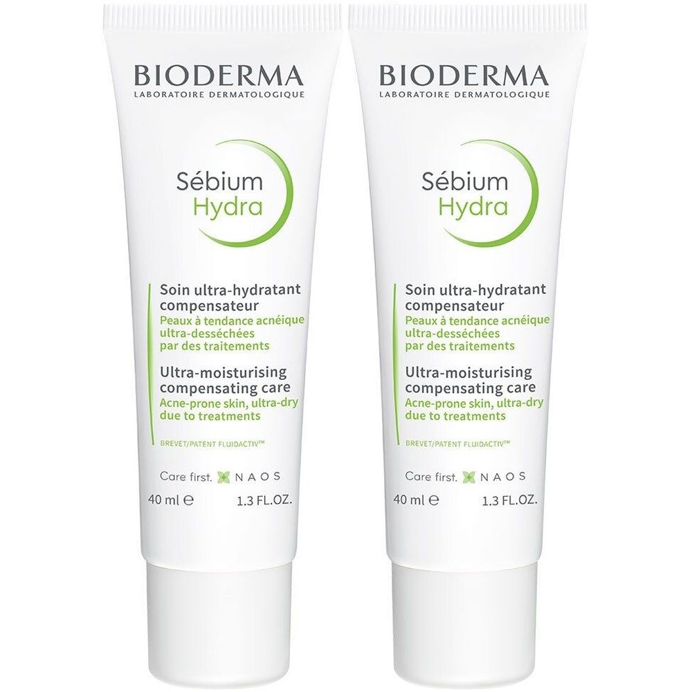 Deux tubes de BIODERMA Sébium Hydra. Tubes blancs avec texte et logo verts. Texte : Ultra-moisturising compensating care.