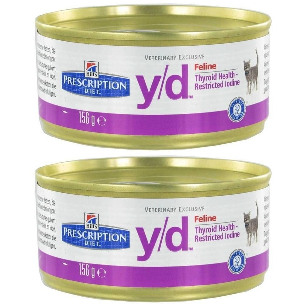 Deux boîtes de nourriture pour chats. Inscription: Hills Prescription Diet y/d Feline, pour la santé thyroïdienne. 156g.