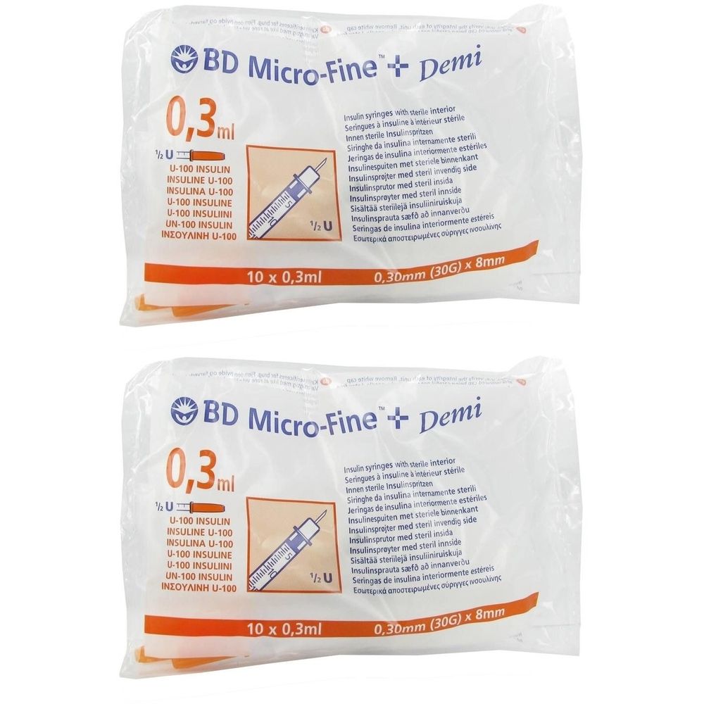 Deux emballages de seringues. Inscription : BD Micro-Fine + Demi, 0,3 ml, U-100 Insuline. Chaque emballage contient 10 seringues.