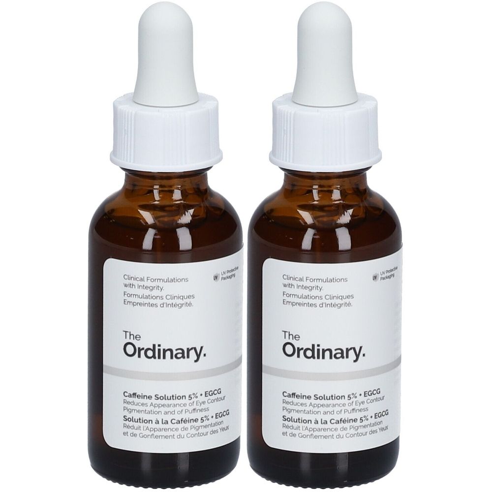 Deux flacons en verre brun avec pipettes blanches. Les étiquettes indiquent "The Ordinary" et "Caffeine Solution 5% + EGCG".