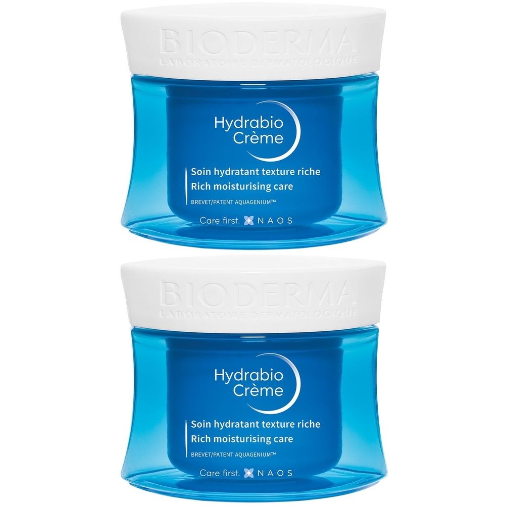 Deux pots bleus avec couvercles blancs. Inscription: Hydrabio Crème, Soin hydratant texture riche. Marque: BIODERMA.