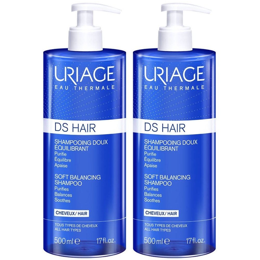 Deux flacons bleus avec pompes blanches.  Chaque flacon porte "URIAGE DS HAIR" et "SOFT BALANCING SHAMPOO".