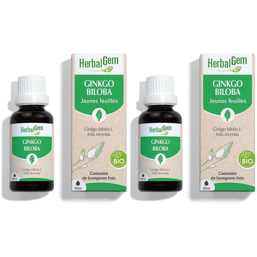 Trois flacons et emballages. Inscription: HerbalGem Ginkgo Biloba, Jeunes feuilles, Bio. Concentré de bourgeons frais.