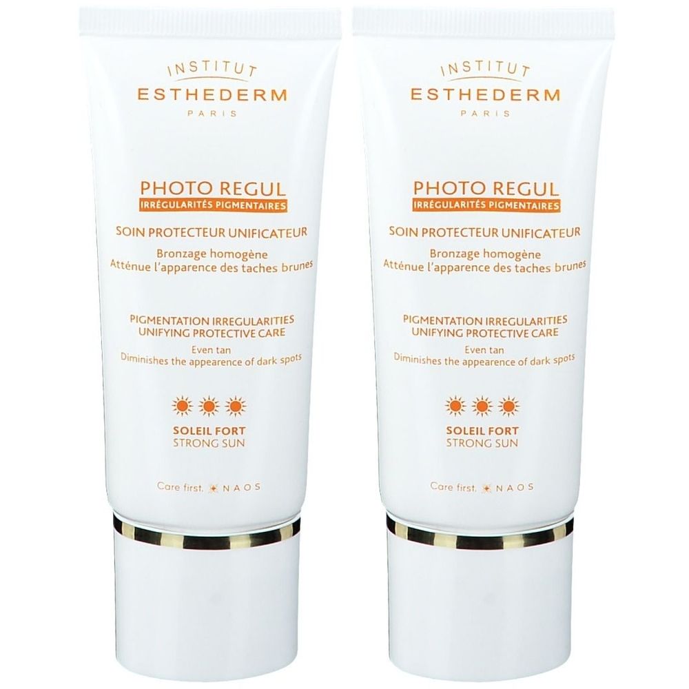 Deux tubes de Photo Regul INSTITUT ESTHEDERM. Tubes blancs avec texte doré. Inscription: Photo Regul, Soin protecteur unificateur, Soleil Fort.