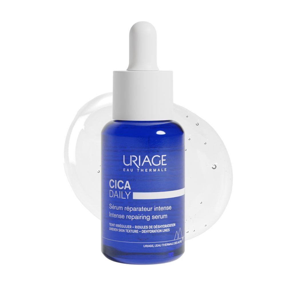Een Uriage Cica Daily flesje met druppelaar op een druppel serum. Herstellend serum.