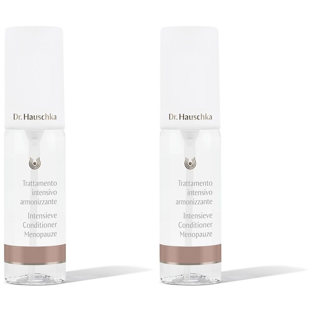 Deux flacons avec bouchon blanc et corps transparent. Inscription : Dr. Hauschka, Trattamento intensivo armonizzante, Intensieve Conditioner Menopauze.