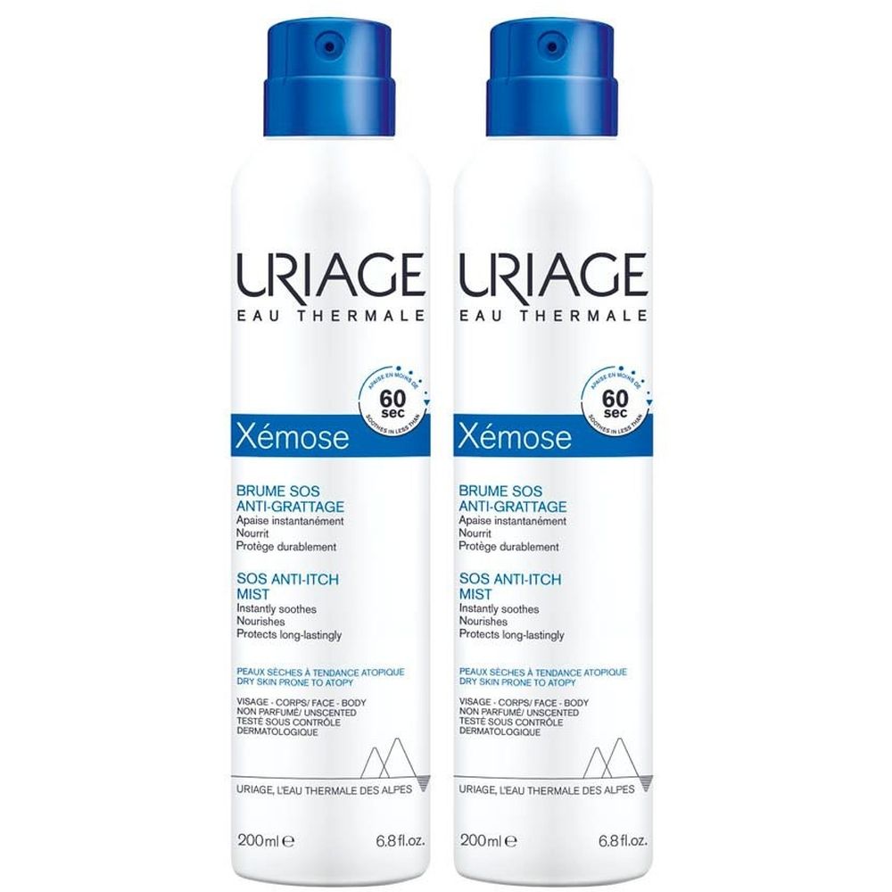 Deux flacons spray blancs avec bouchons bleus. Inscription: URIAGE, Xémose, Brume SOS Anti-grattage. Texte en français et anglais.