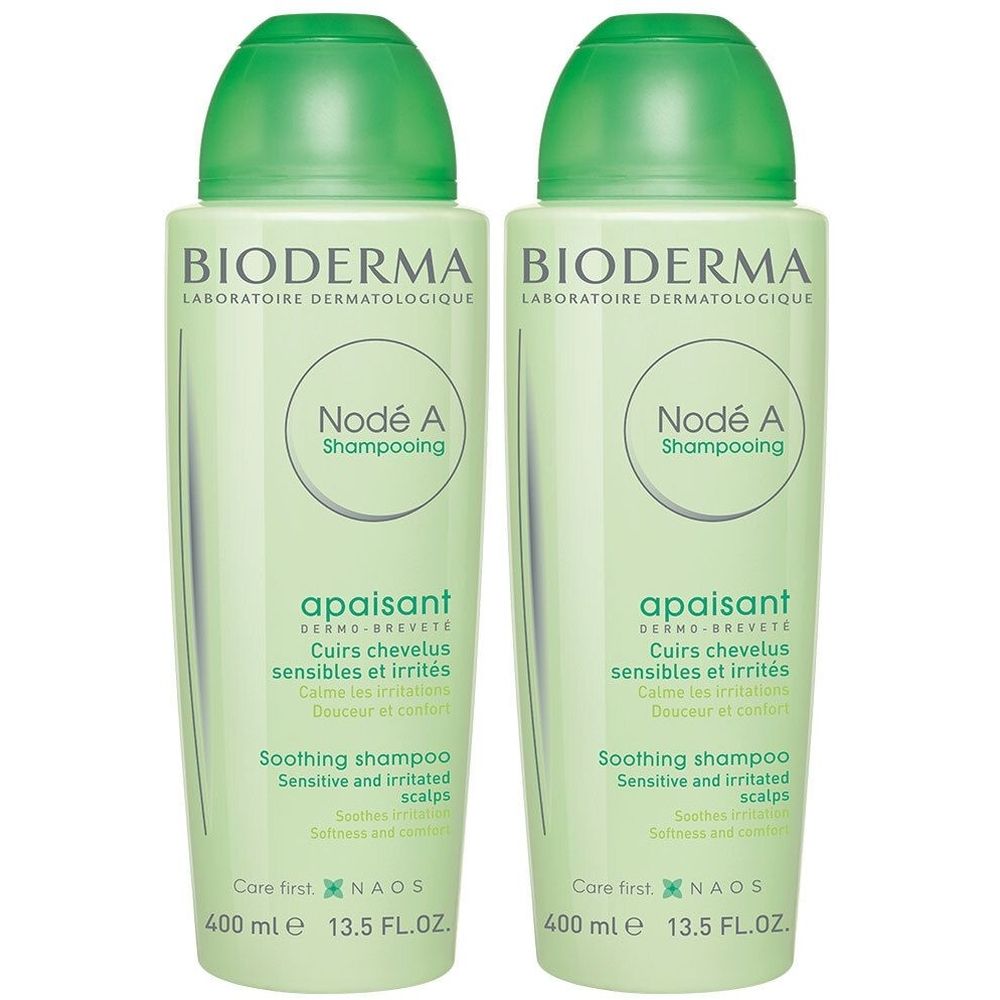 Deux flacons verts de shampooing BIODERMA Nodé A. Inscription: apaisant, Cuirs chevelus sensibles et irrités, Soothing shampoo.